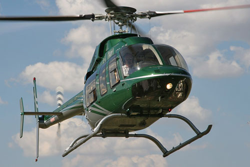 Hélicoptère Bell 407 ZS-RLM d'HELIOS EXECUTIVE HELICOPTER CHARTER