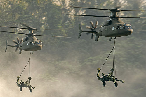 Hélicoptères Defiant X transportant des pièces d'artillerie sous élingue