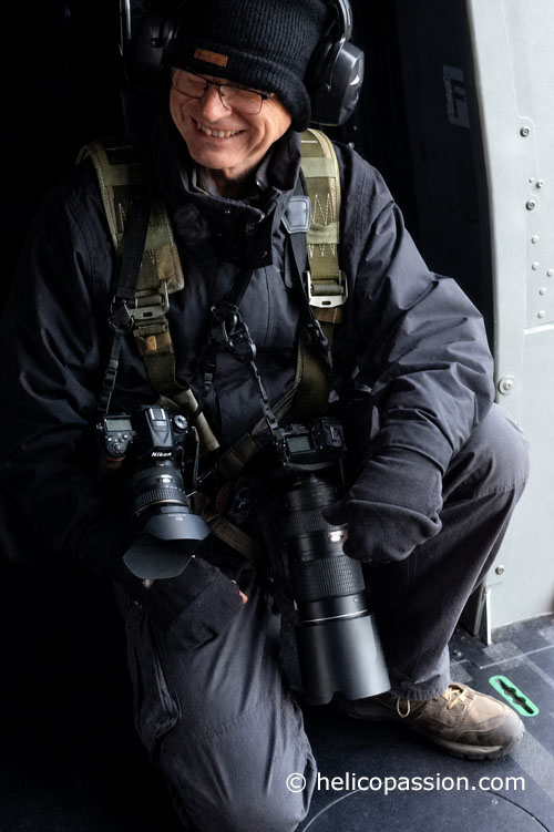 André Bour aboard a French Army NH90 helicopter during a field reportage